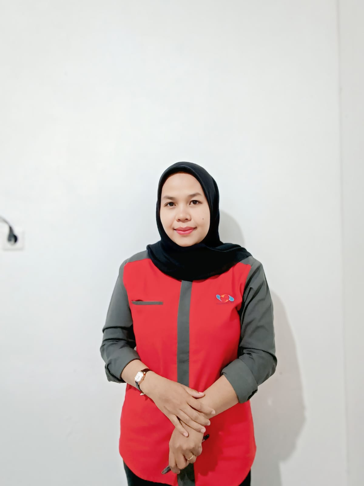Lilis Pujiani, S. AB